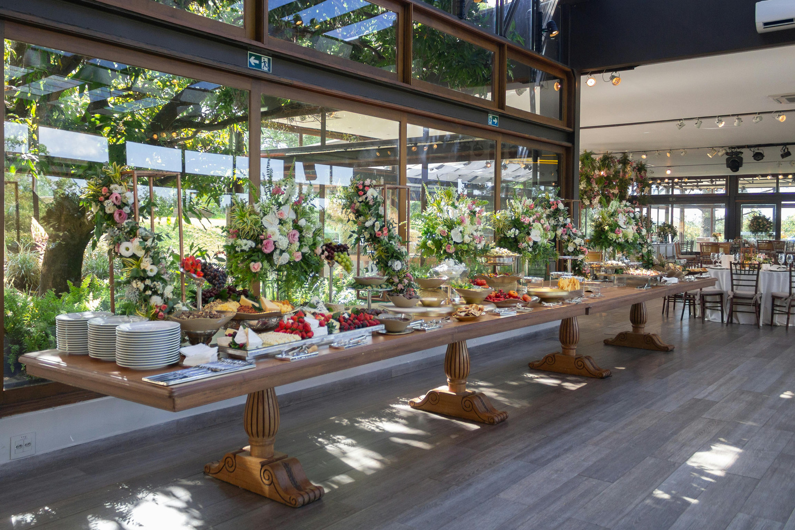 Catered buffet spread with floral decor